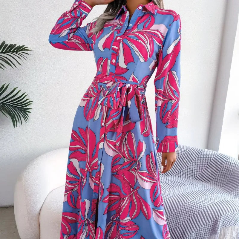 Woman wearing a colorful floral dress with a white background