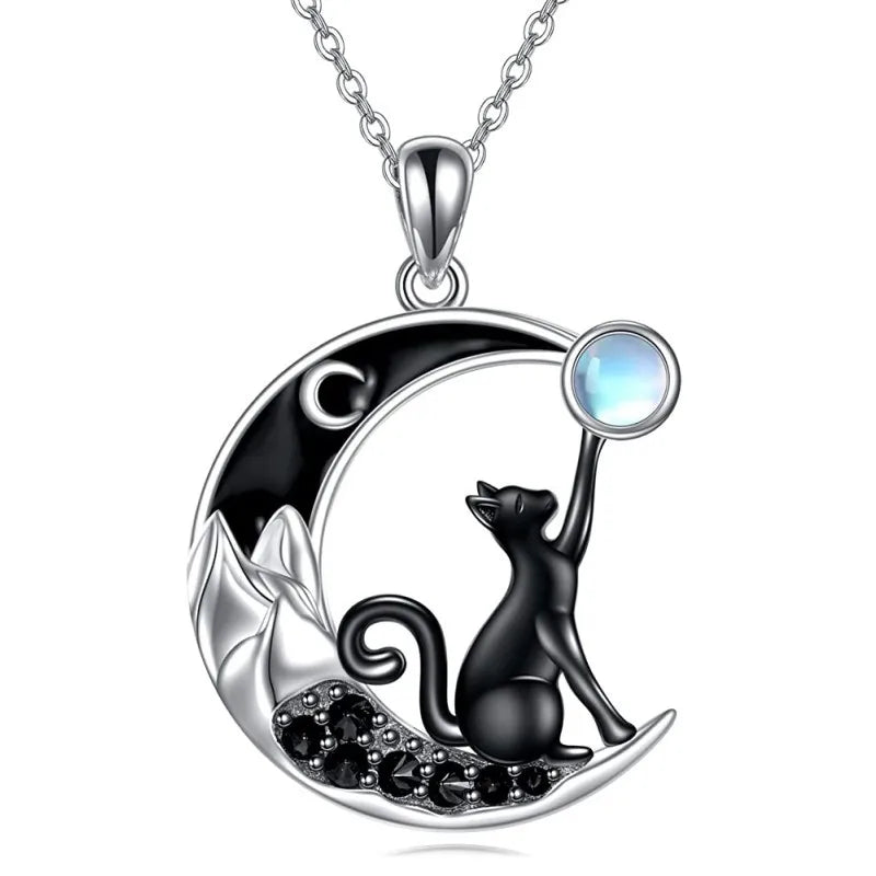 Cat on a moon pendant necklace with a moonstone on a white background