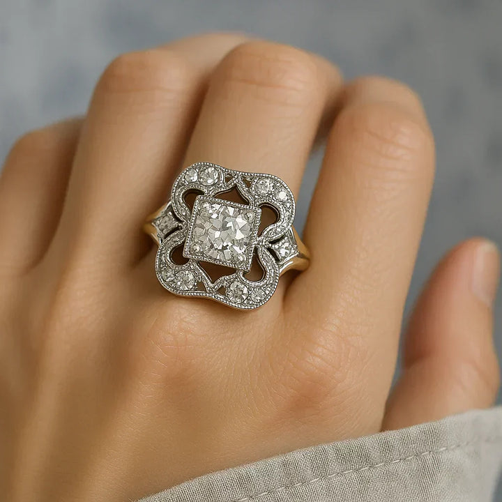 Silver ring with a large diamond on a person&